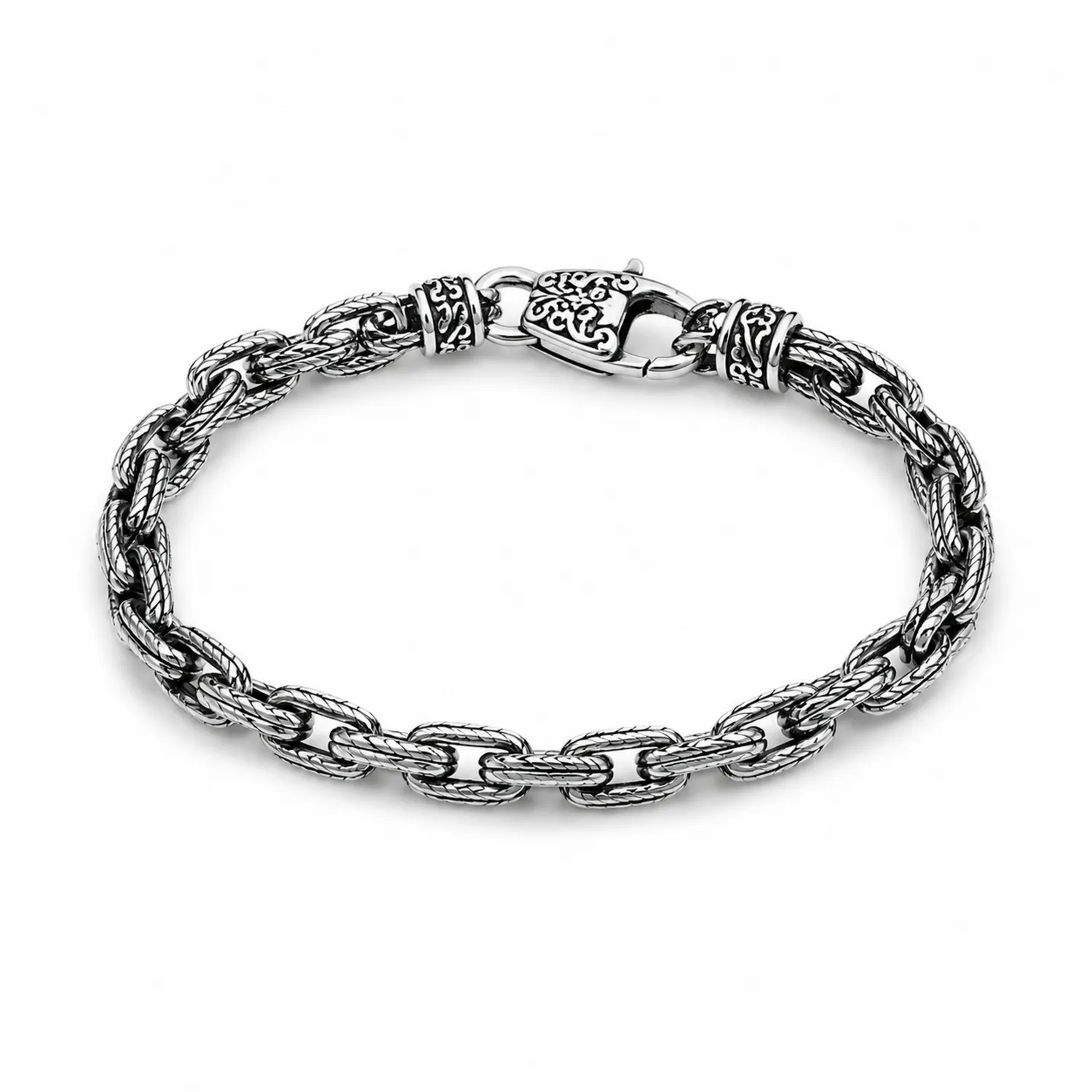 Bracelet en argent chaîné tressé avec motifs gravés