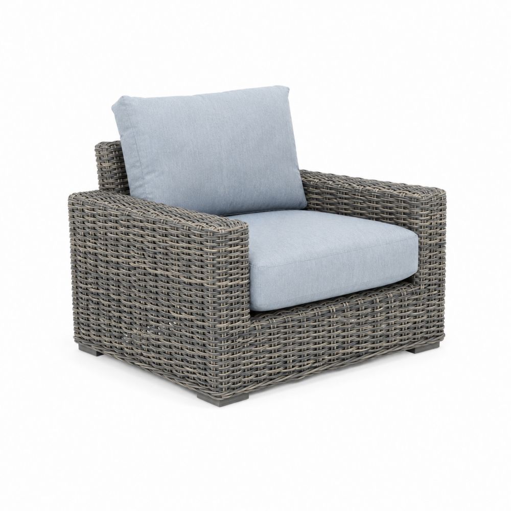 Sillón de ratán sintético con cojines de poliéster azul