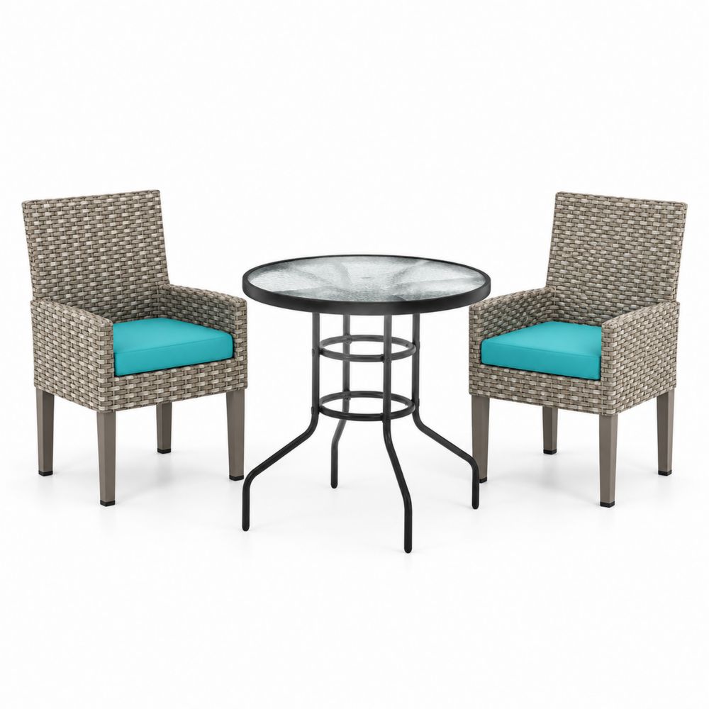 Juego de muebles de exterior: Mesa redonda de vidrio y 2 sillas de mimbre sintético, cojines azules