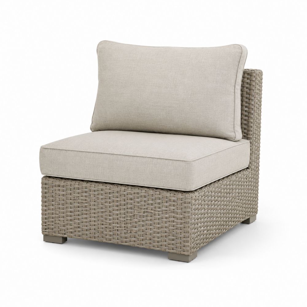 Fauteuil en résine tressée avec coussins en polyester