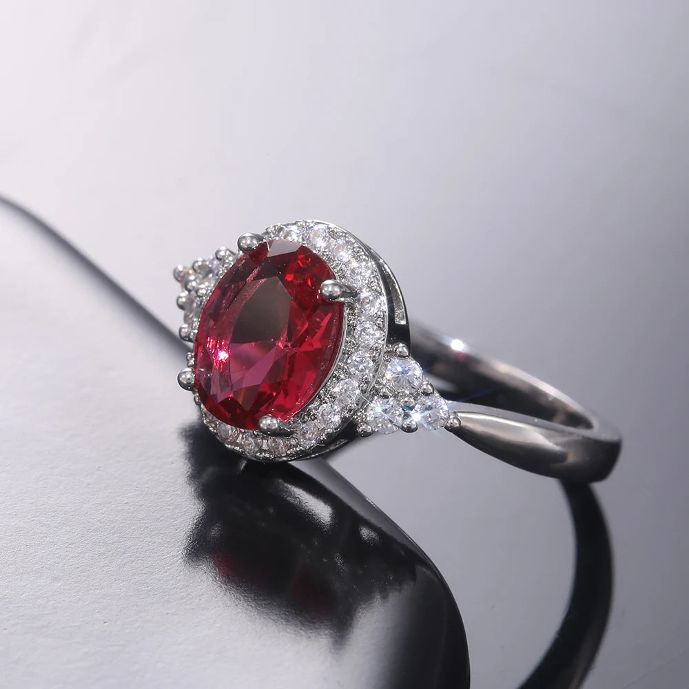 Huitan Dazzling Cubic Zirconia Women Rings Romantic Oval Red Stone Engage Wedding-losil