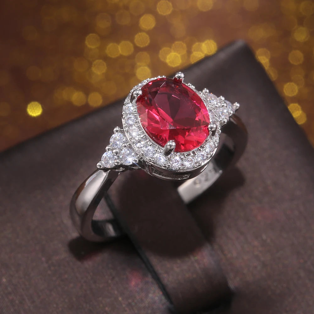 Huitan Dazzling Cubic Zirconia Women Rings Romantic Oval Red Stone Engage Wedding-losil