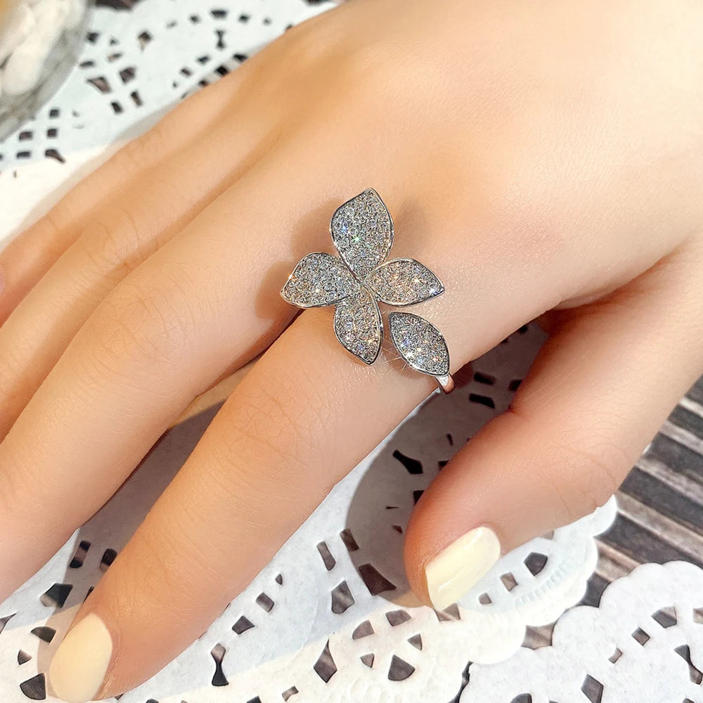 Huitan Gorgeous Leaf/Flower Design Adjustable Opening Rings for Women Paved Bling Cubic-losil