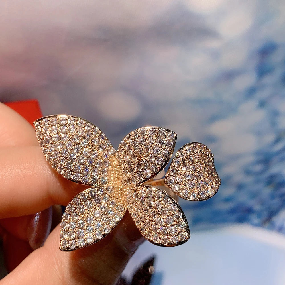 Huitan Gorgeous Leaf/Flower Design Adjustable Opening Rings for Women Paved Bling Cubic-losil