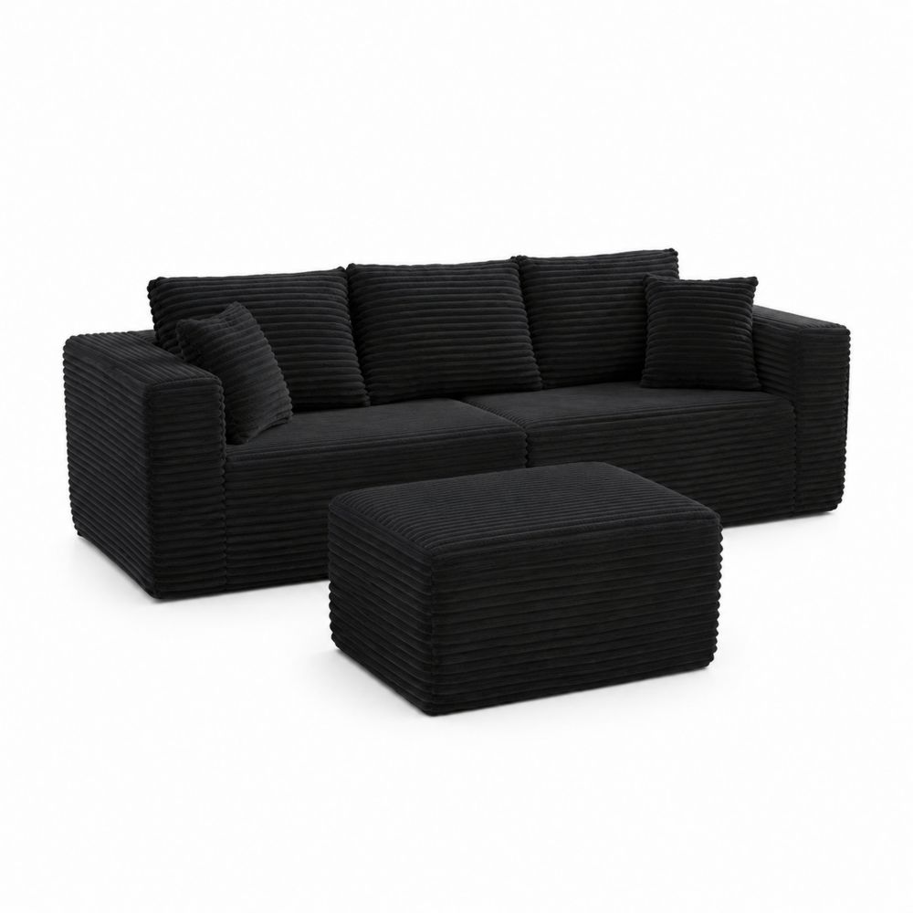 Canapé en velours côtelé noir avec repose-pieds