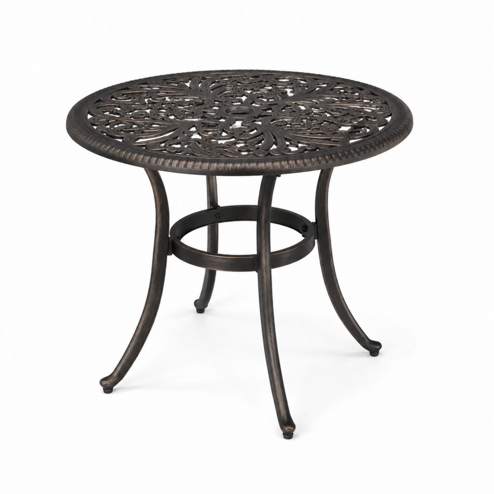 Table de jardin ronde en métal bronzé motif ajouré