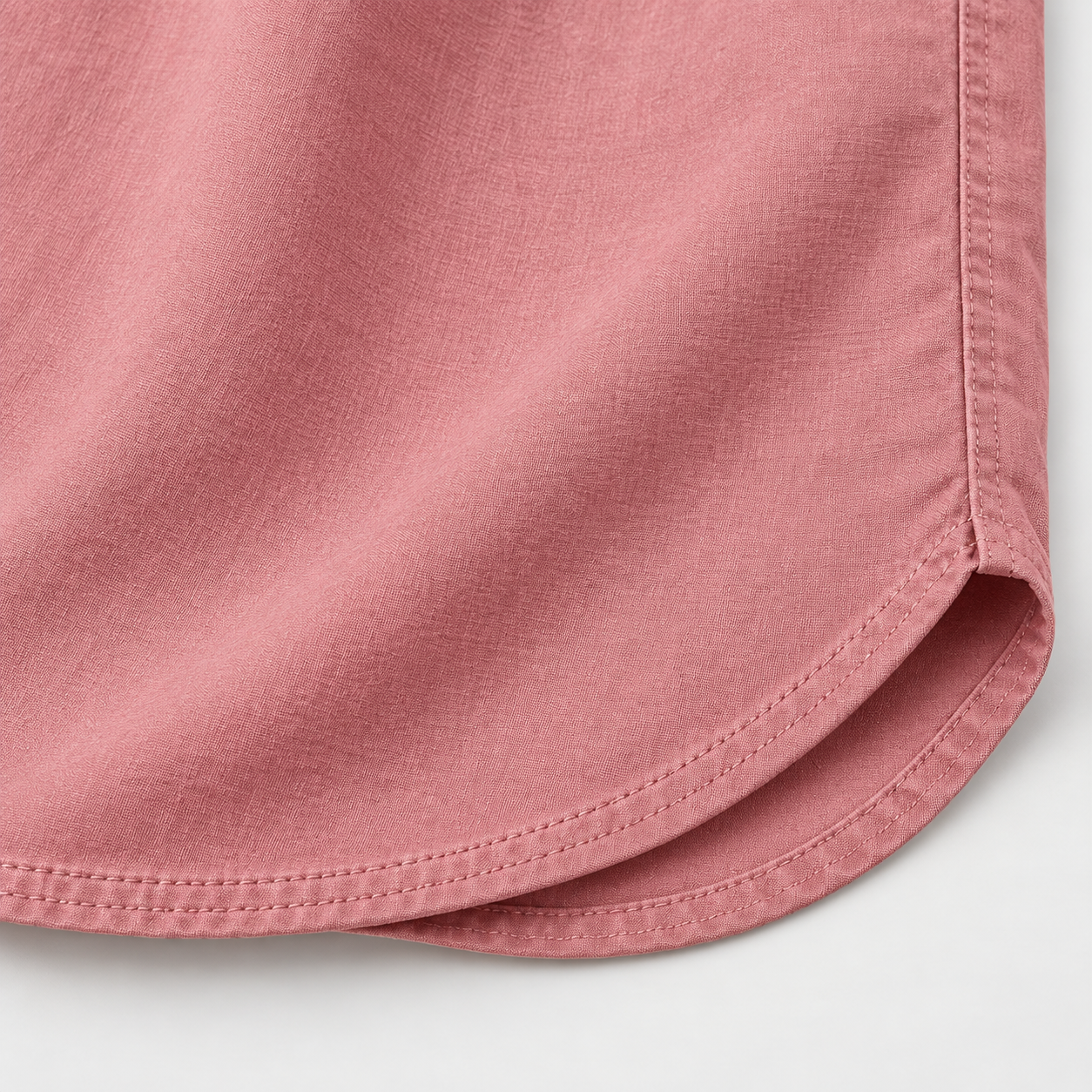 Woven Fabric and Curved Hem Detail