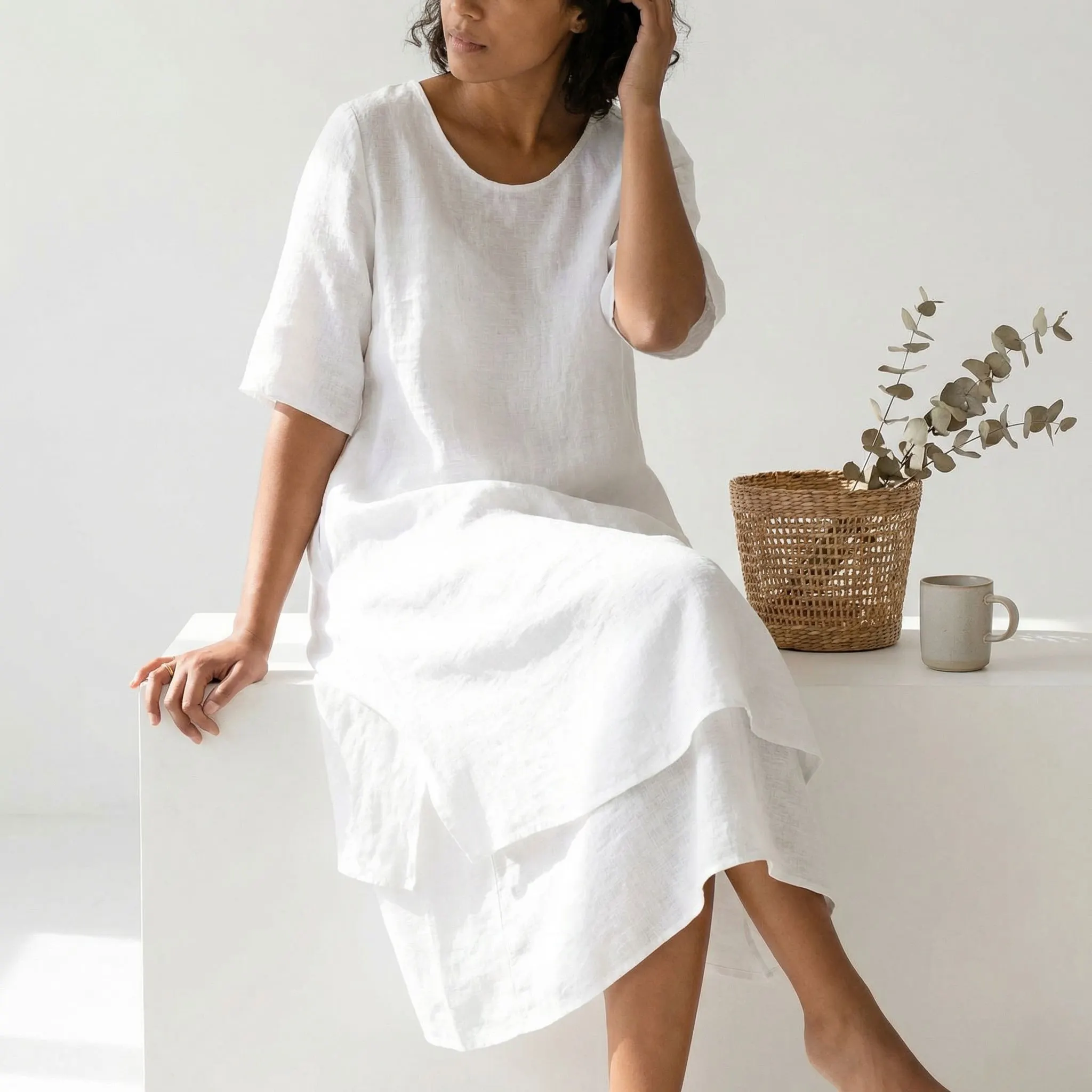 Model showcasing midi length dress