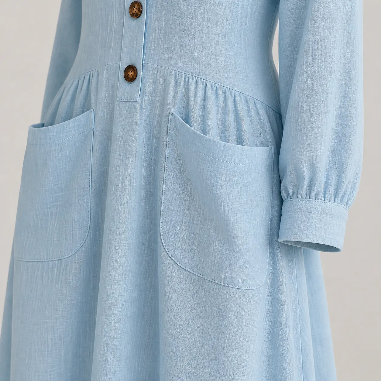 Oversized patch pockets and cuff detail