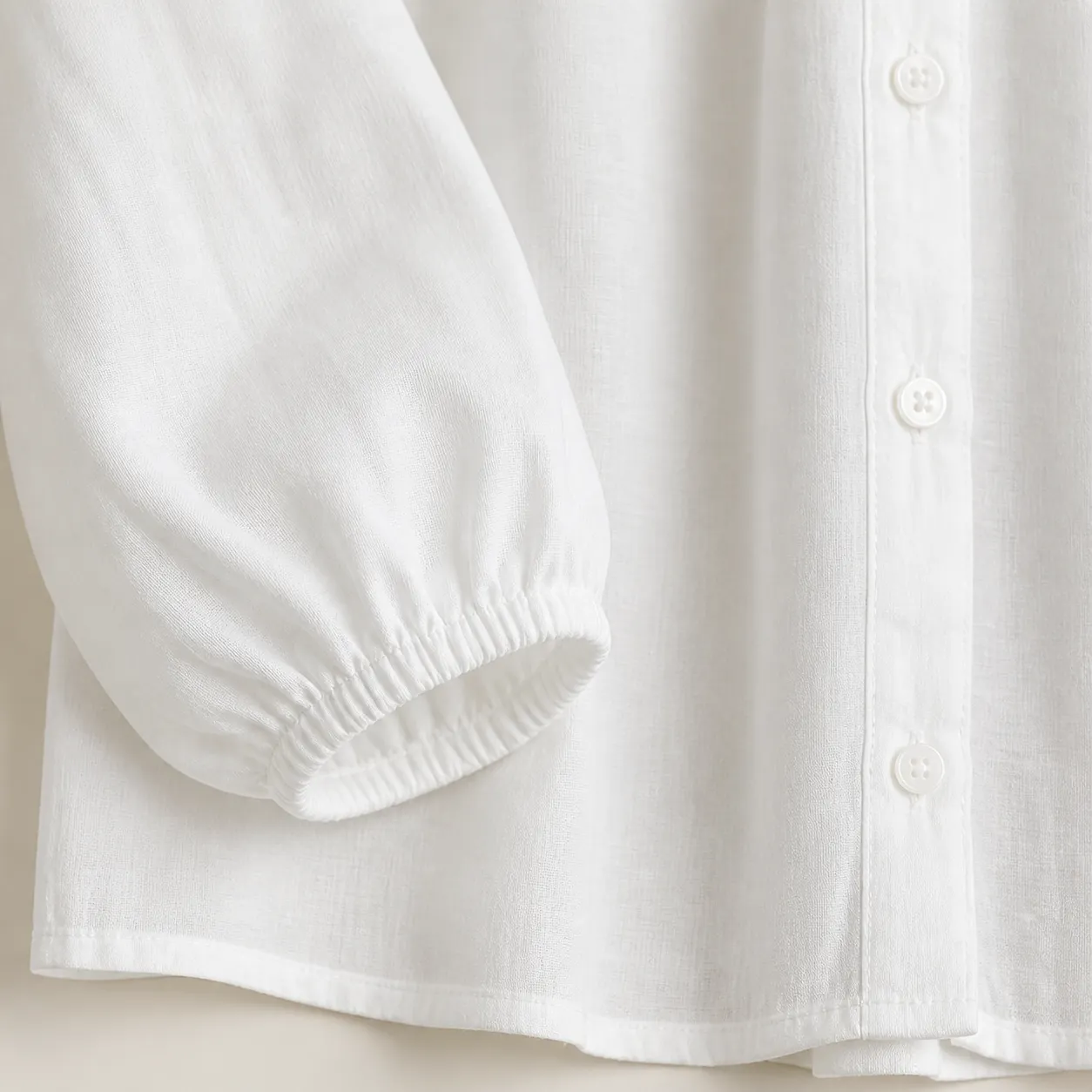 Gathered cuff and hem detail
