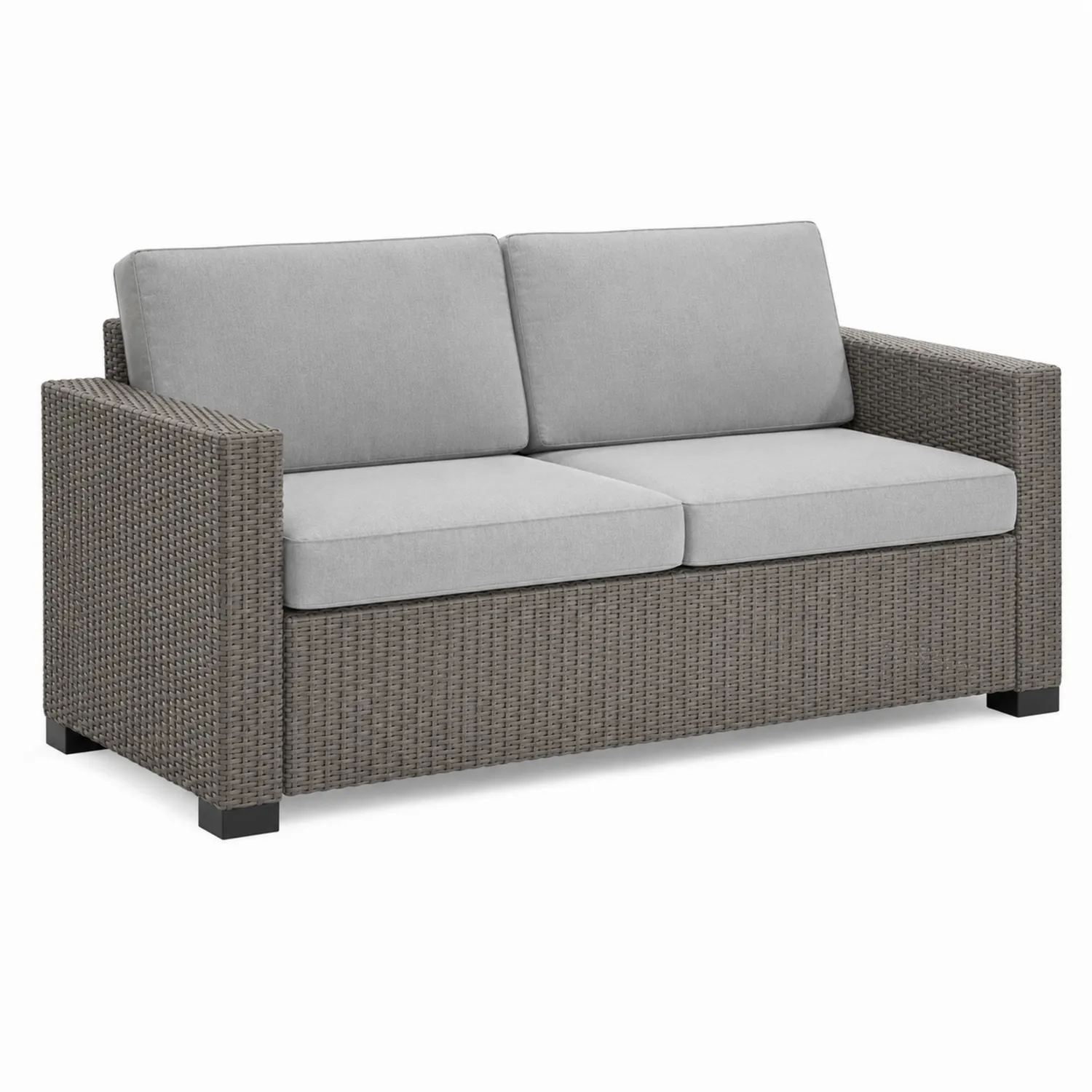 Sofa ogrodowa z technorattanu z szarymi poduszkami