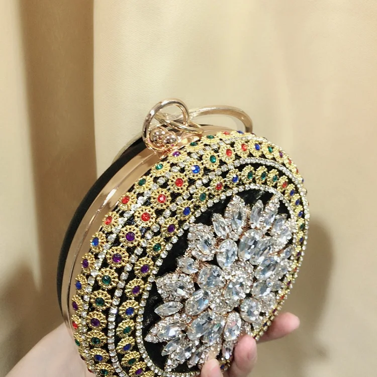 Oblique View of the Black YNSSK Round Rhinestone Evening Bag