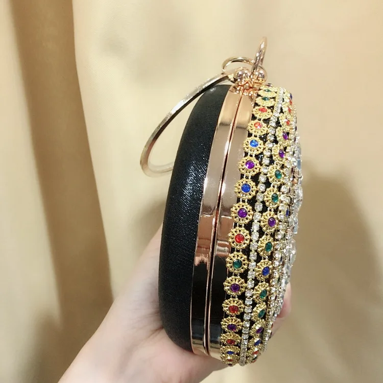 Side View of Black YNSSK Round Rhinestone Evening Bag