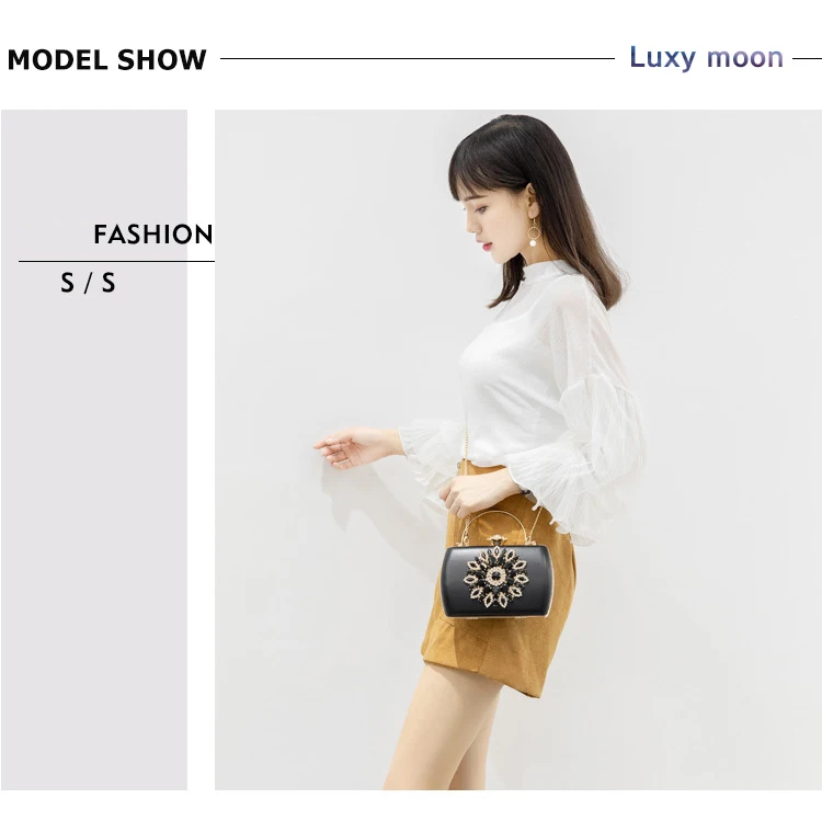 Modeling show for YNSSK Rhinestone Flower Dinner Bag