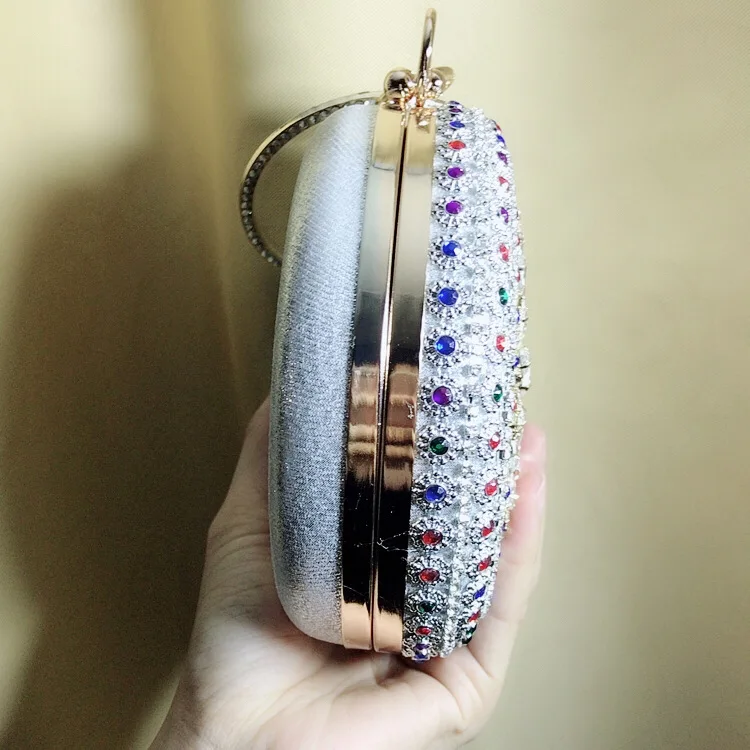 Side View of the Silver YNSSK Round Rhinestone Evening Bag