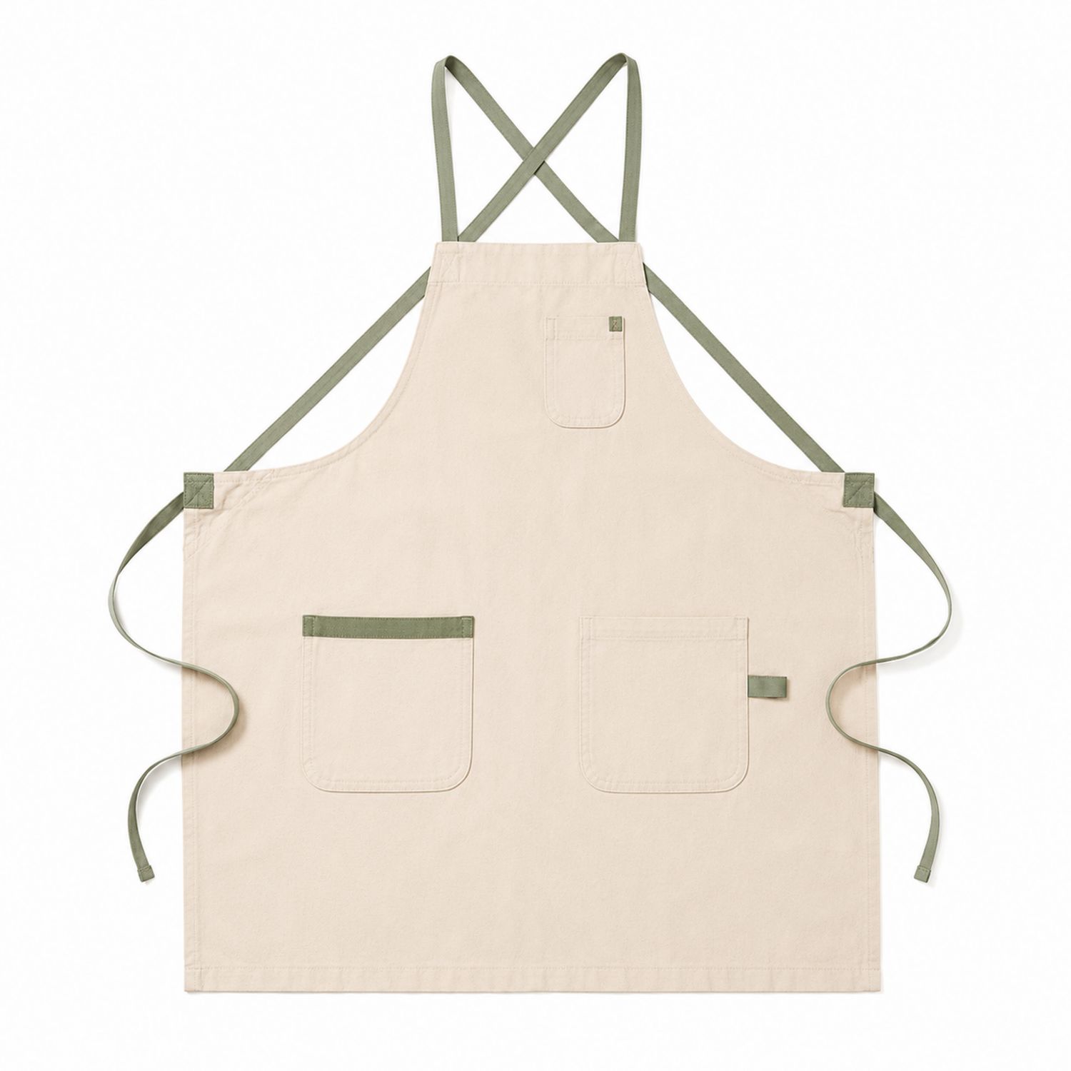 Beige Küchenschürze mit grünen Trägern und Taschen