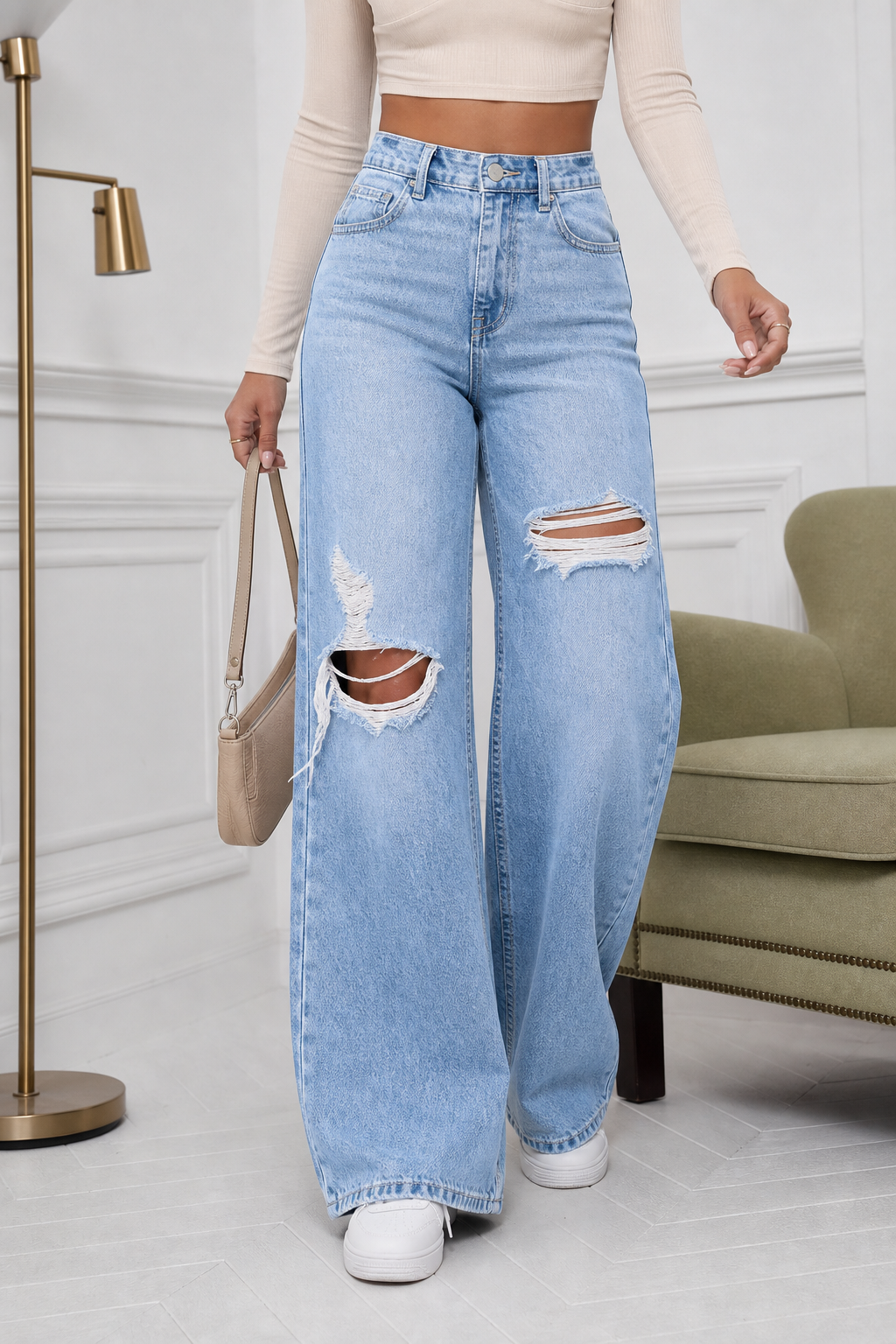 Light blue high rise ripped wide leg jeans front view