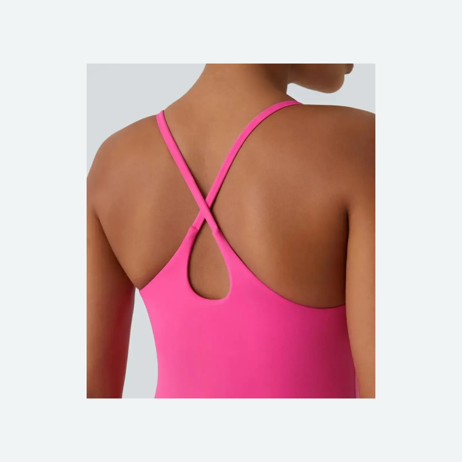 Crisscross back strap and teardrop cutout detail