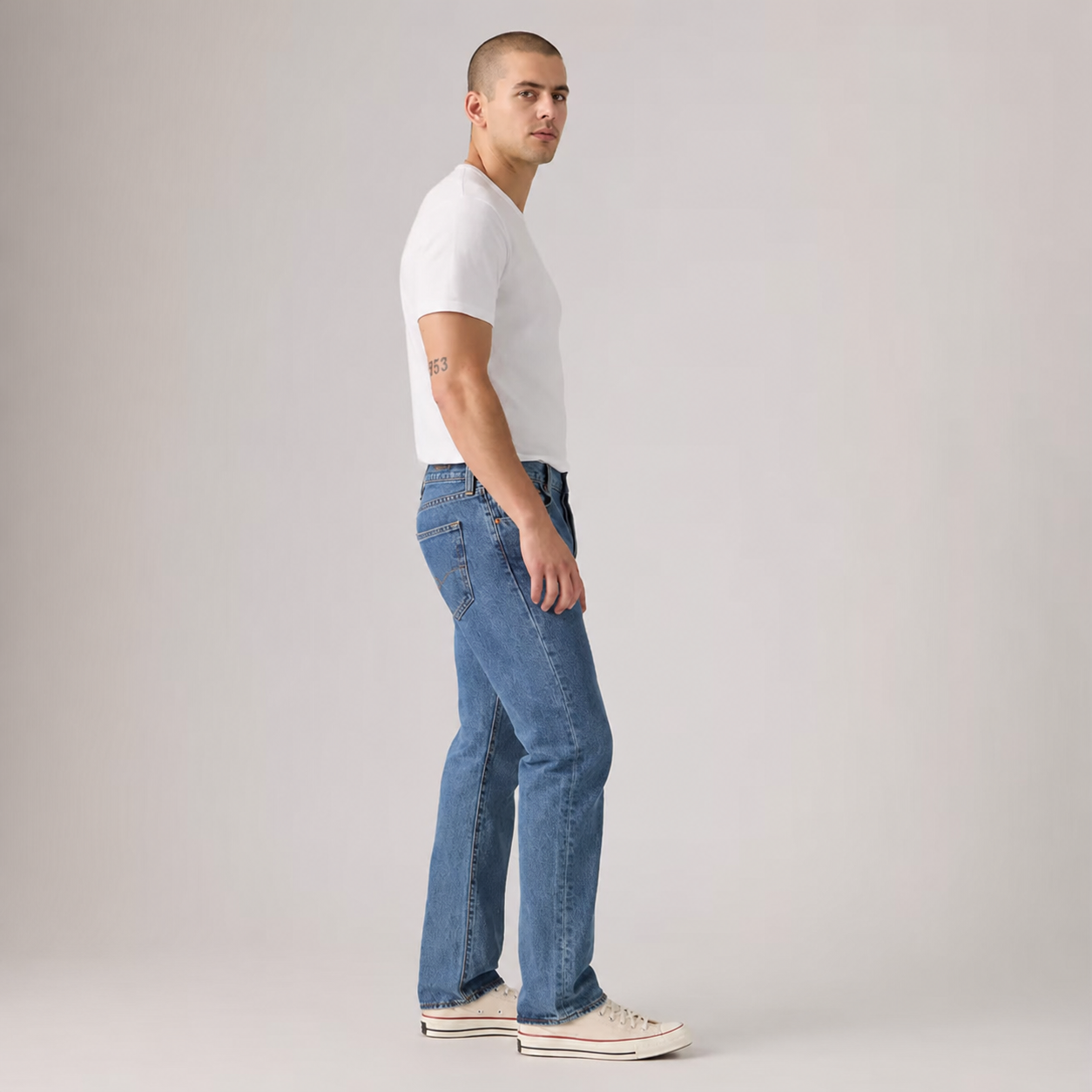 Loose straight denim jeans side fit view