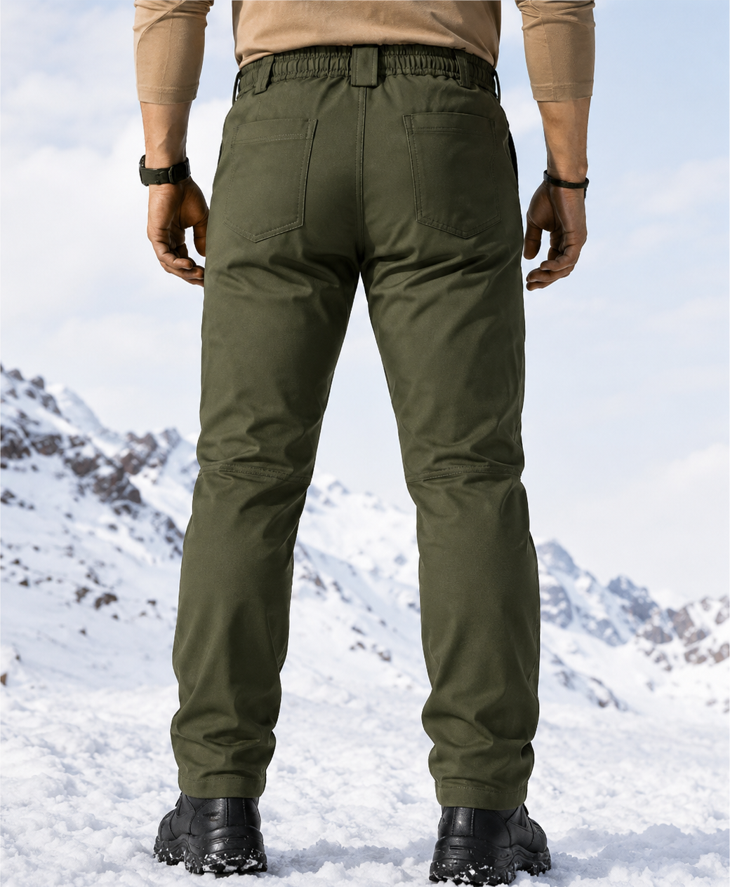 Back view showing elastic waistband and rear pockets on olive green cargo pants.