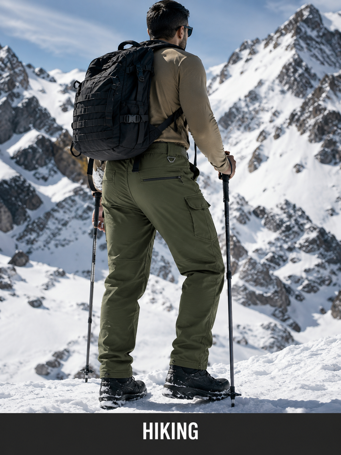 Hiking use case wearing olive green cargo pants in snowy mountains.