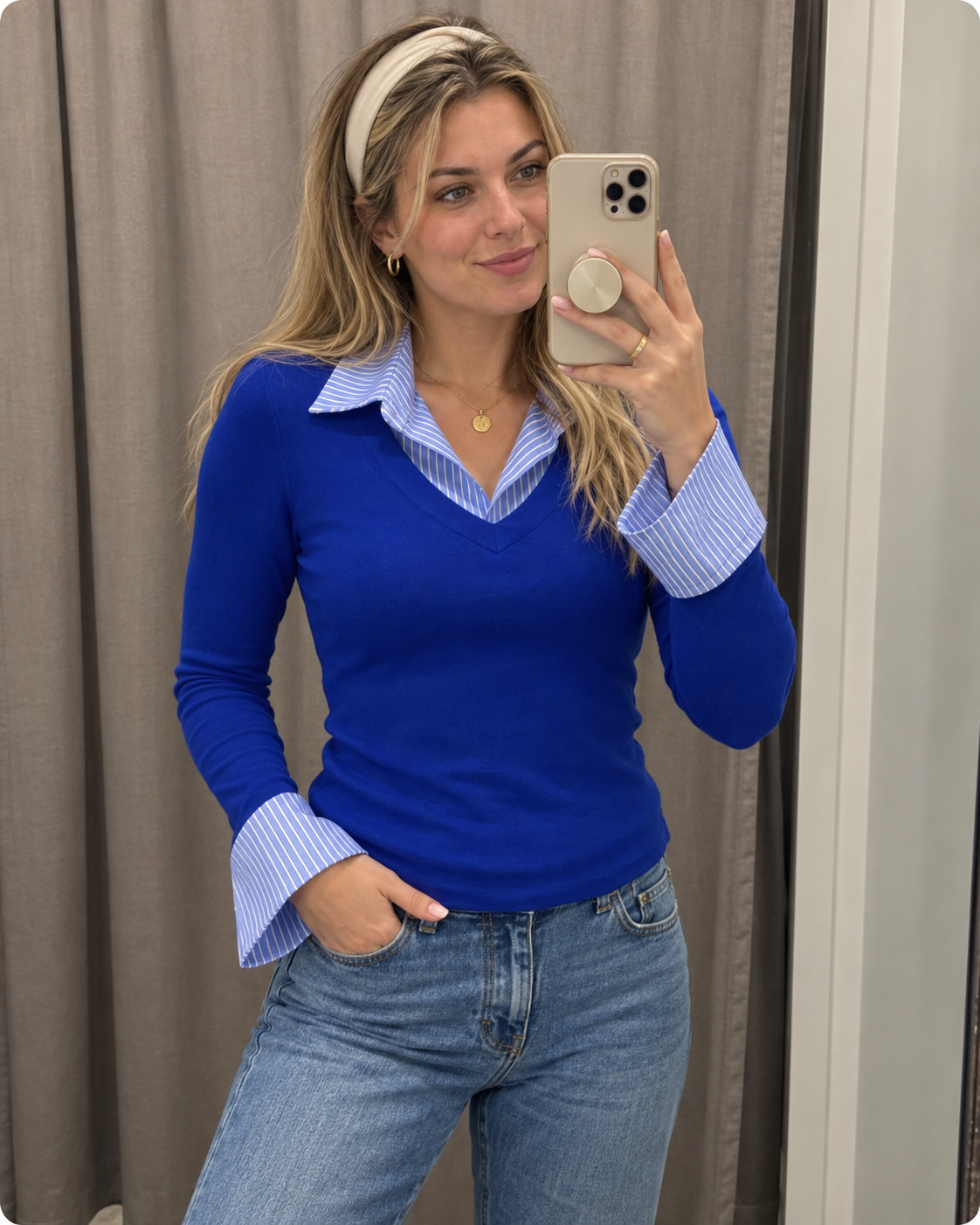 Royal blue top styled with jeans
