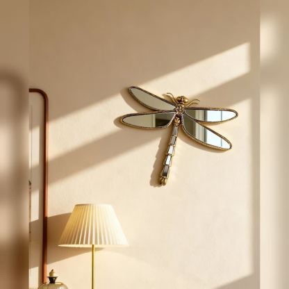 Dragonfly mirror displayed on a softly lit wall