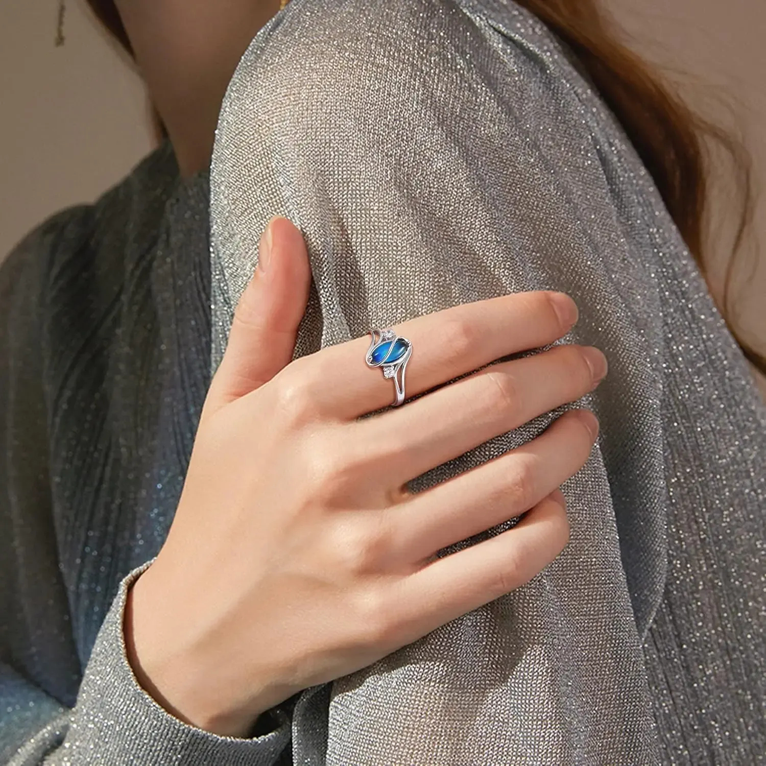 Model wearing the sterling silver mood ring on hand - elegant everyday jewelry