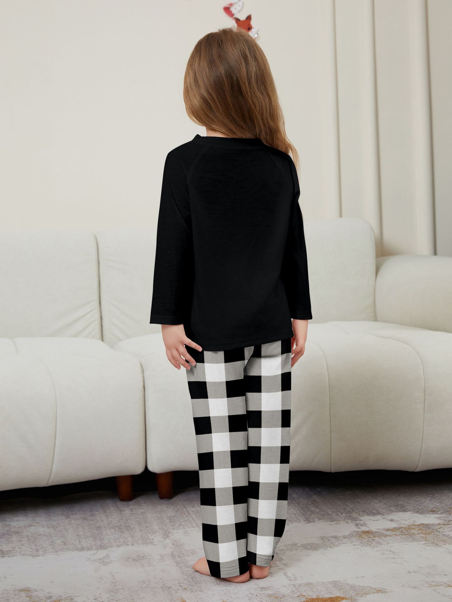 Black “We Are Family” Plaid Family Pajamas