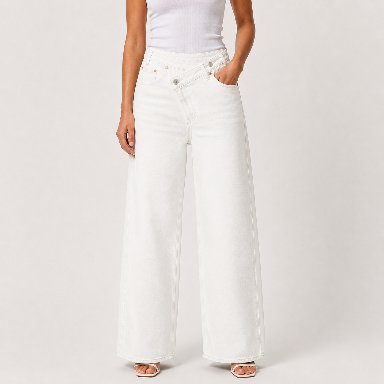 Clean white asymmetric wide leg denim jeans