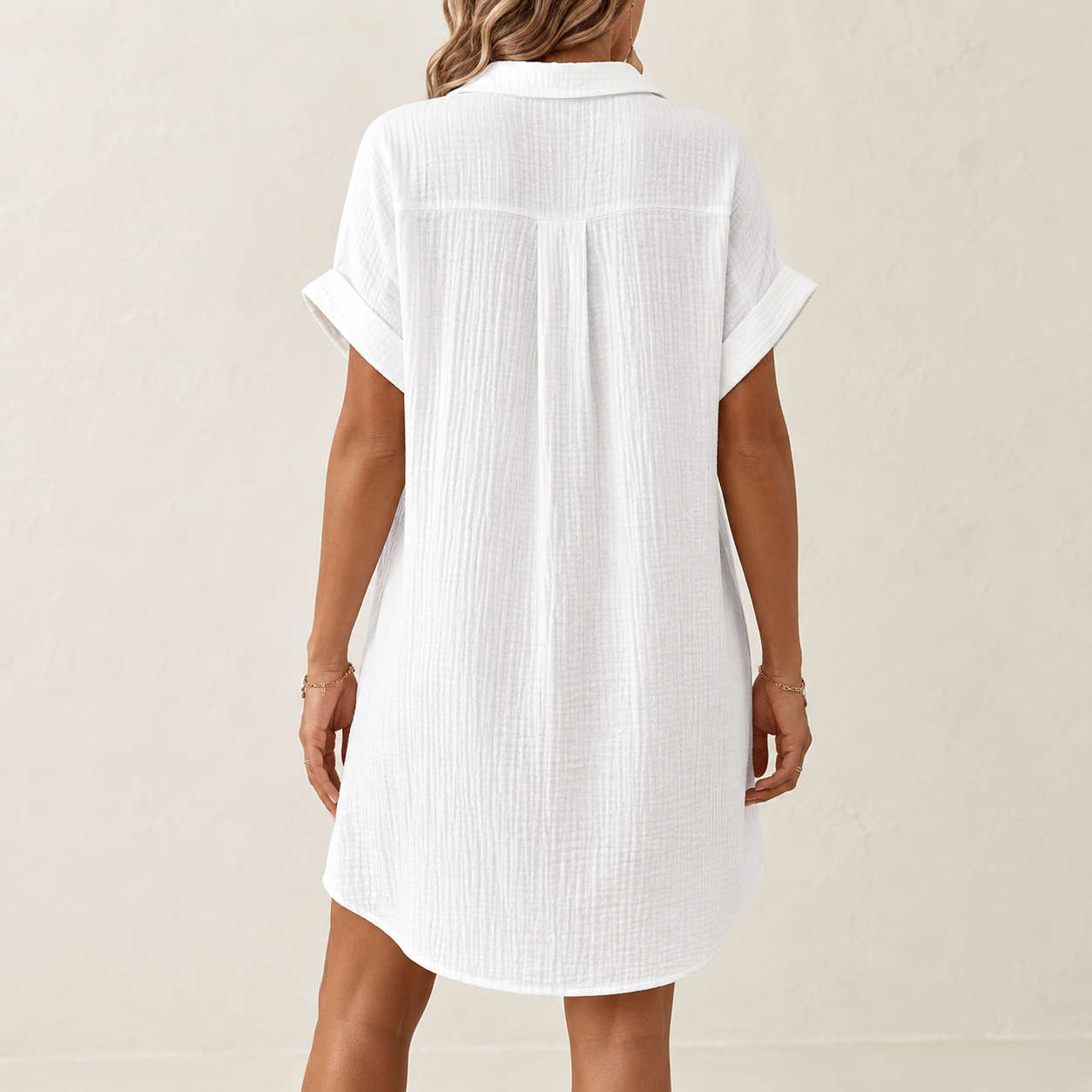 Back view of soft white crinkle button down shirt dress