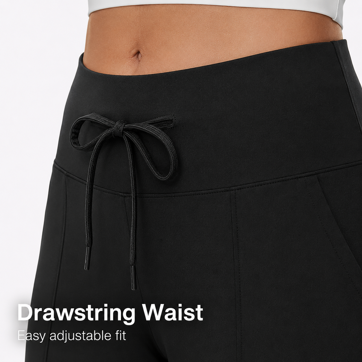 Close detail of drawstring waist on black wide leg lounge pants