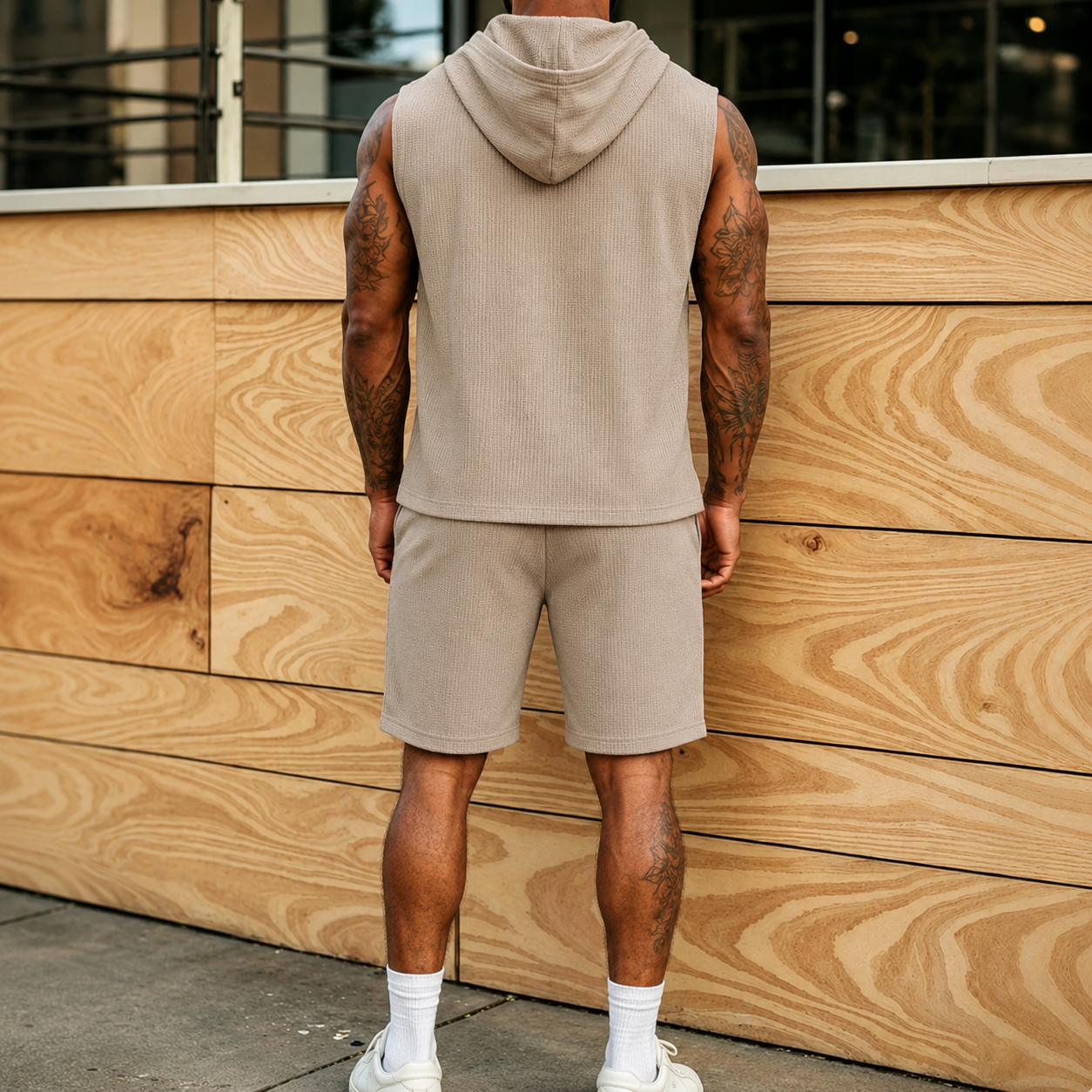 Back view showing hood, sleeveless armholes and matching shorts