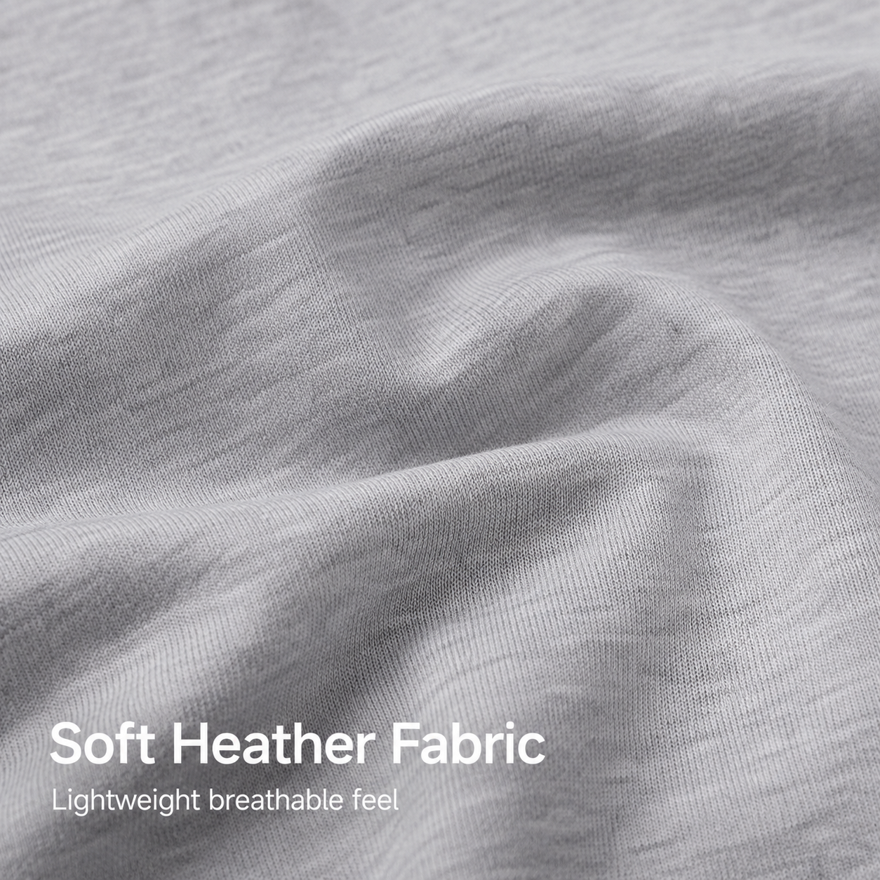 Soft heather knit fabric detail on gray athletic tee