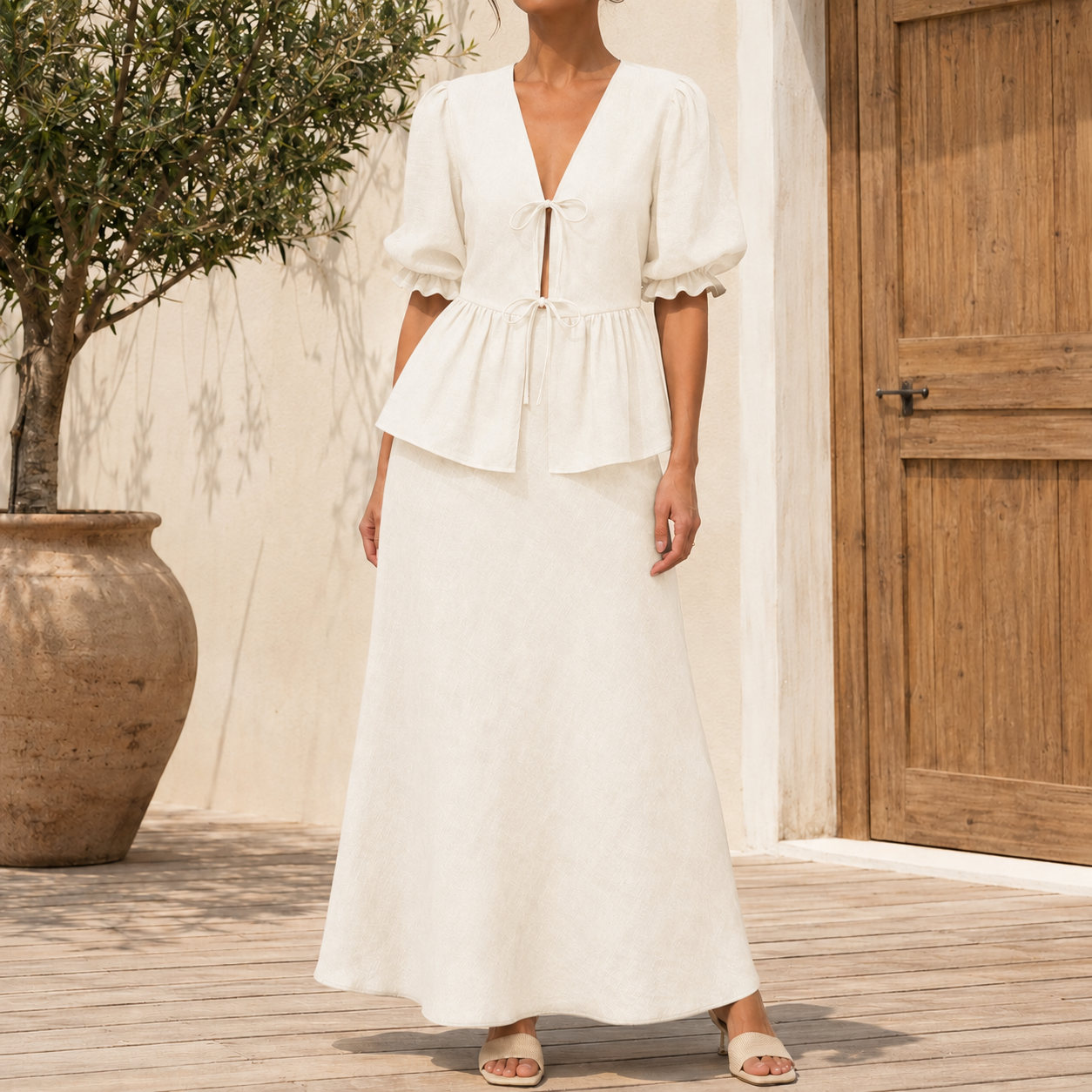 Ivory cream tie front puff sleeve top and maxi skirt on model