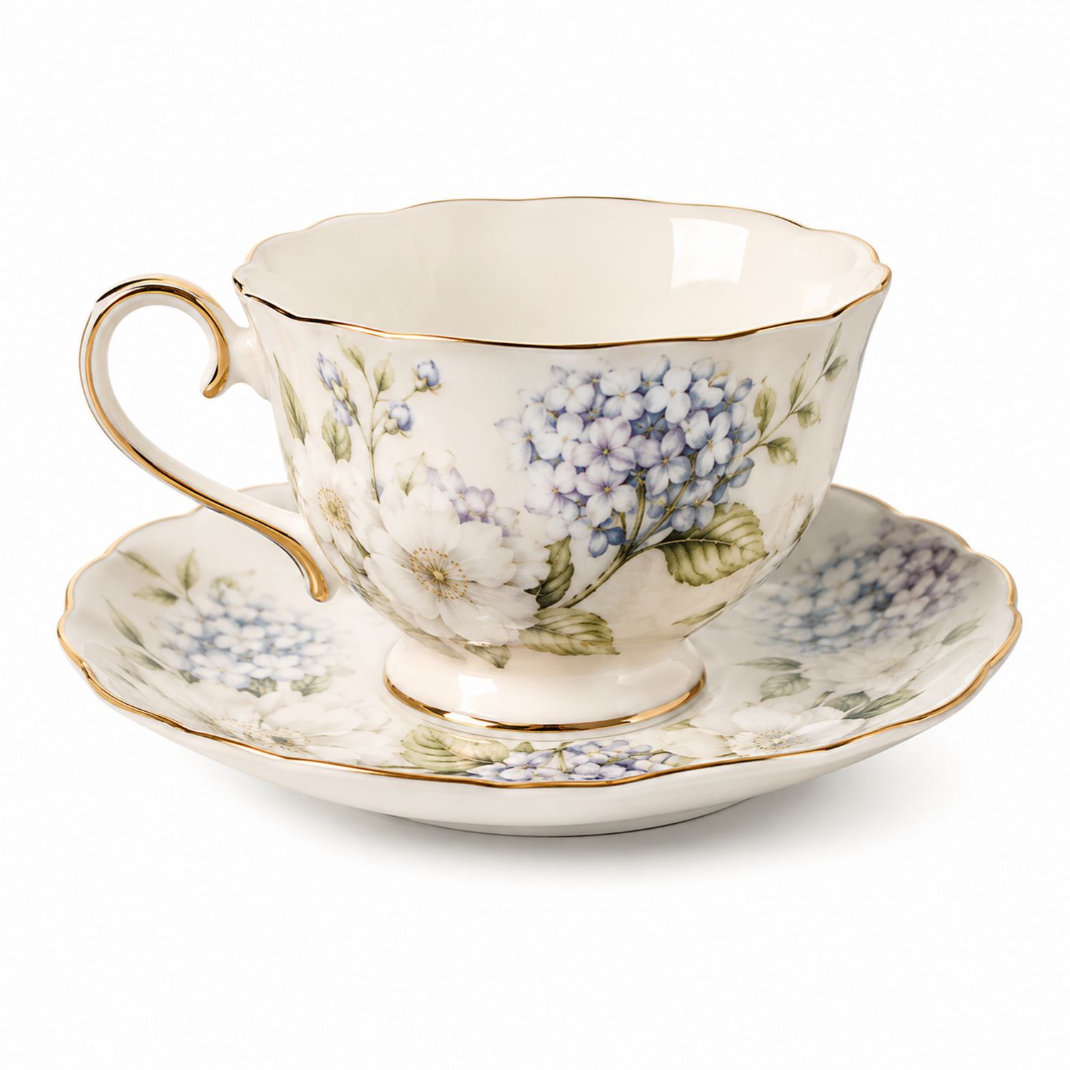 Taza de té con platillo con diseño floral y detalles dorados