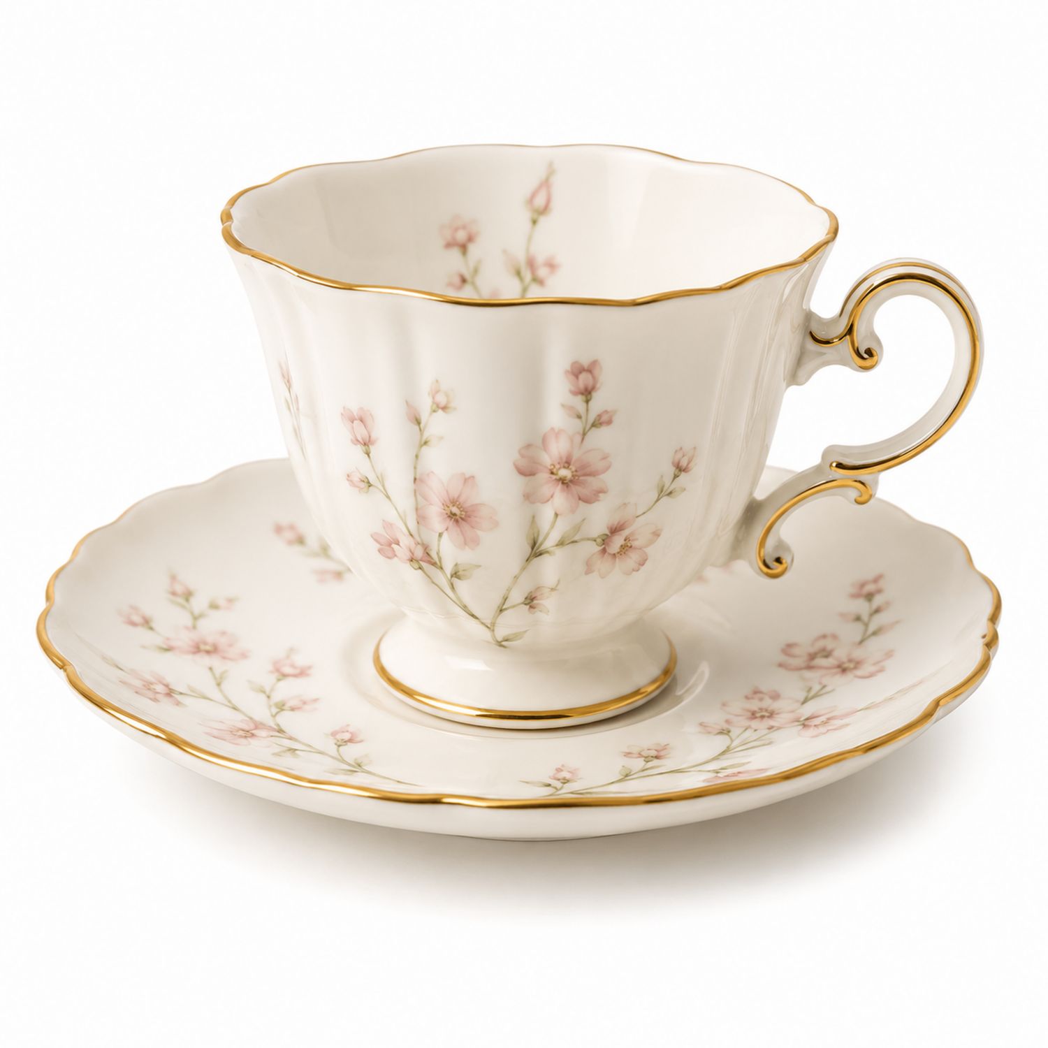 Taza de té de porcelana con diseño floral rosado y bordes dorados