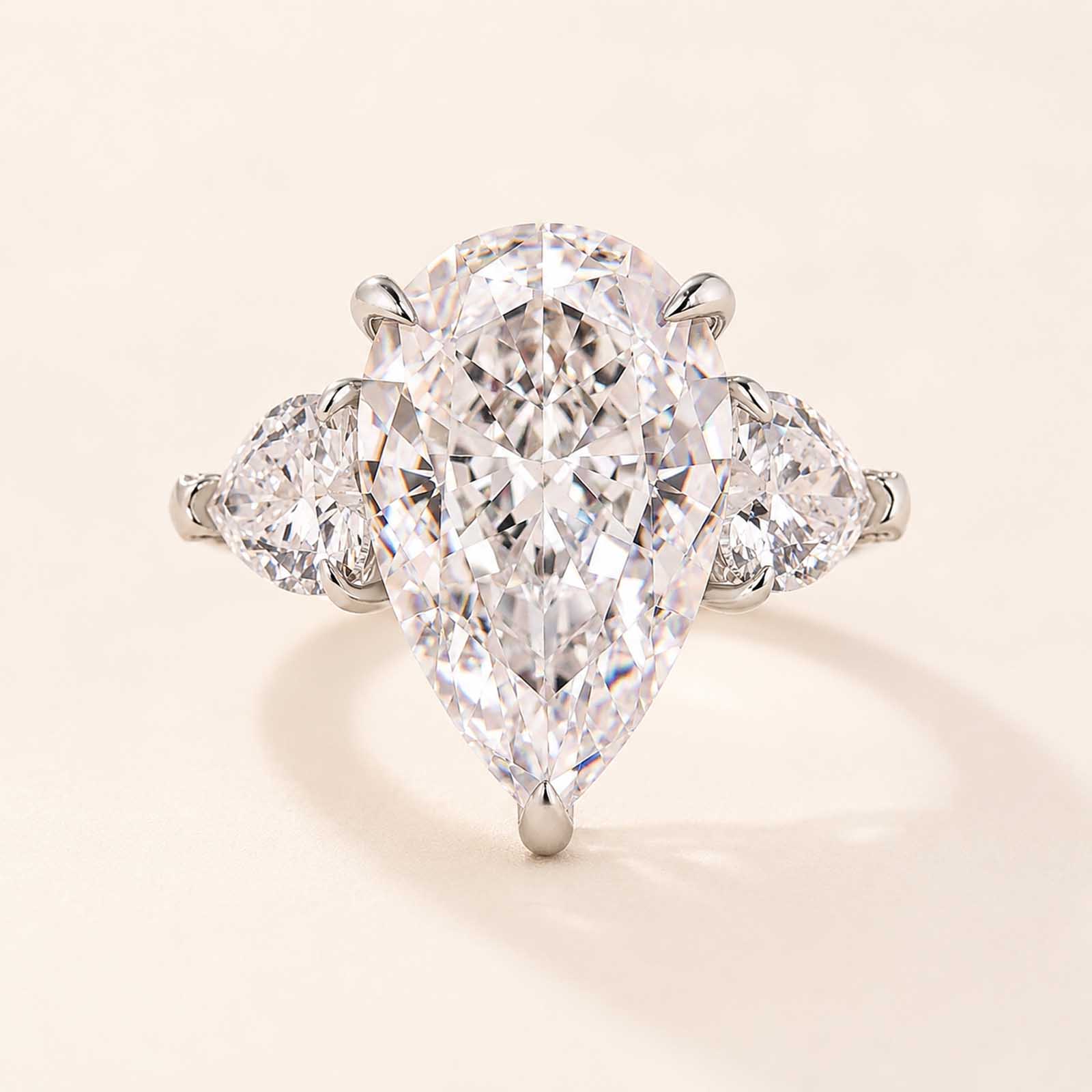 Stunning 8.0Ct Pear Cut Three Stone Rings with Heart Cut Side Stones