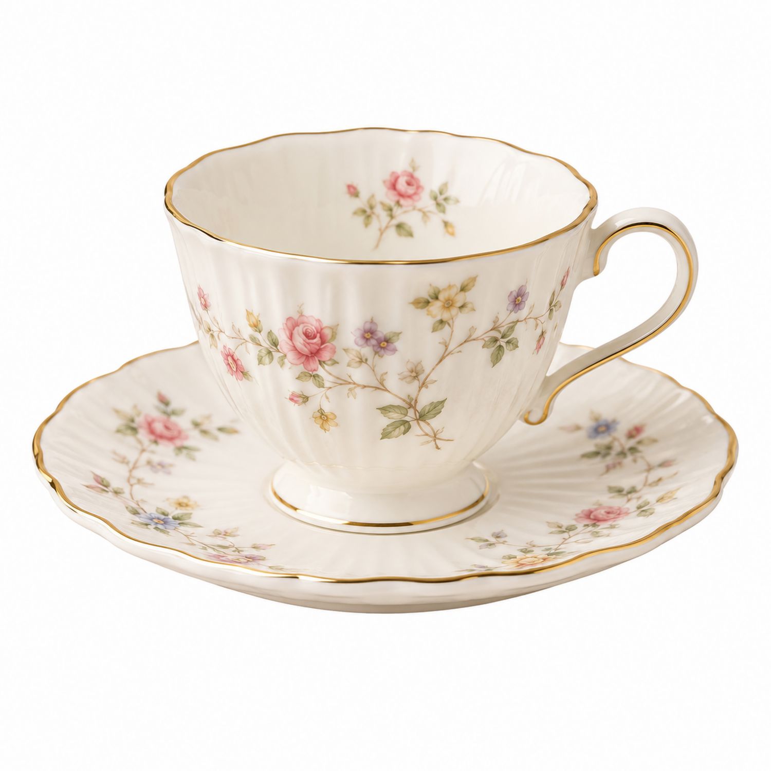 Tazza da tè in porcellana con motivi floreali e bordo dorato
