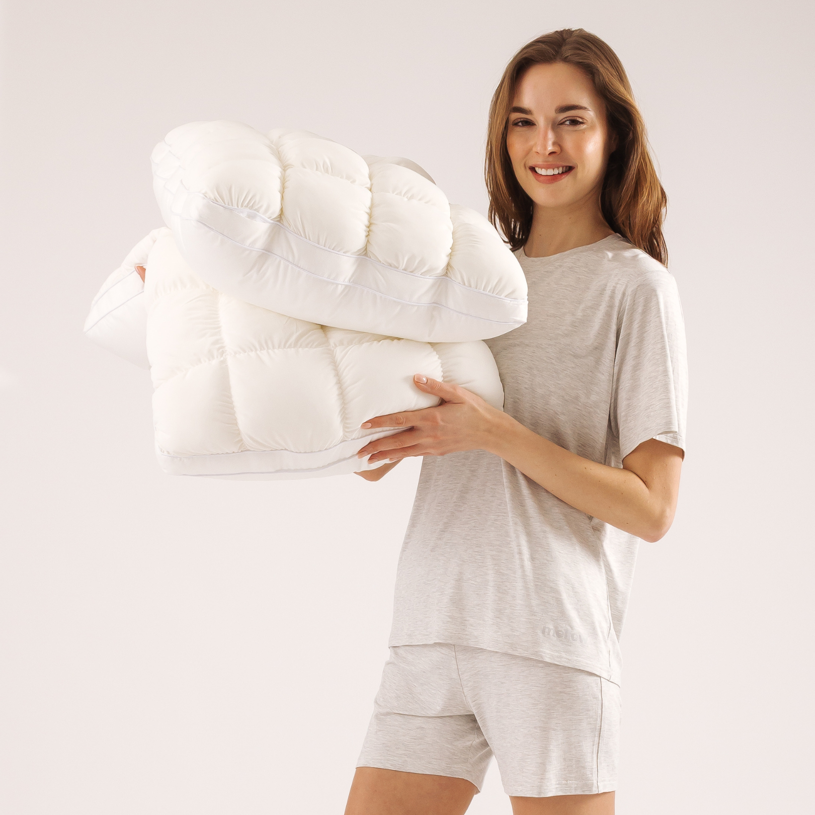 Puff Pillow.Quilted puff-grid design, cooling to the touch, and a cloud-like fill that never goes flat. 