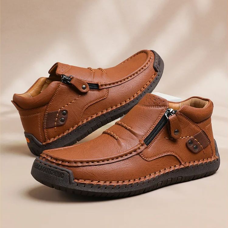 Brown side-zip shoes with visible stitching