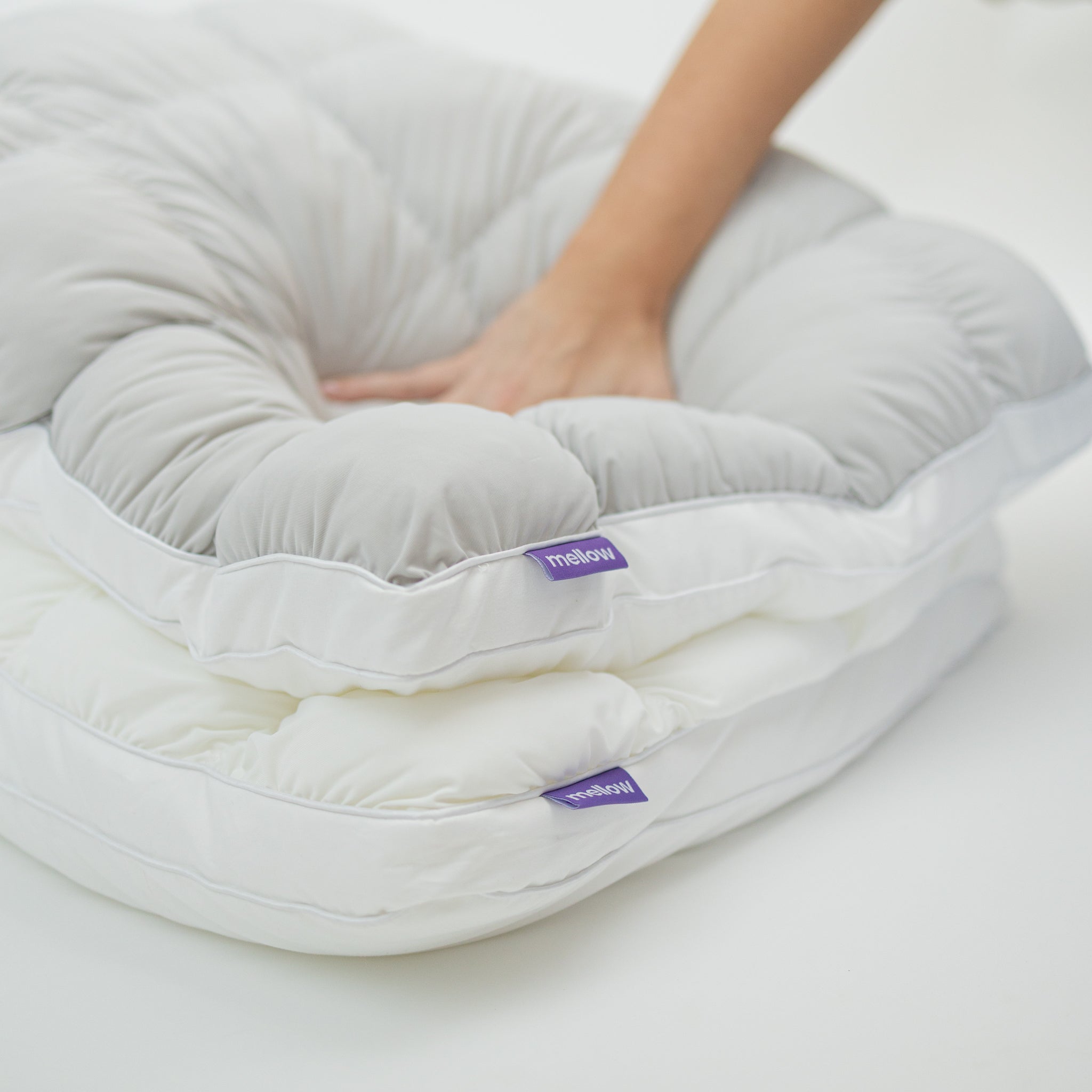 Puff Pillow.Quilted puff-grid design, cooling to the touch, and a cloud-like fill that never goes flat. 
