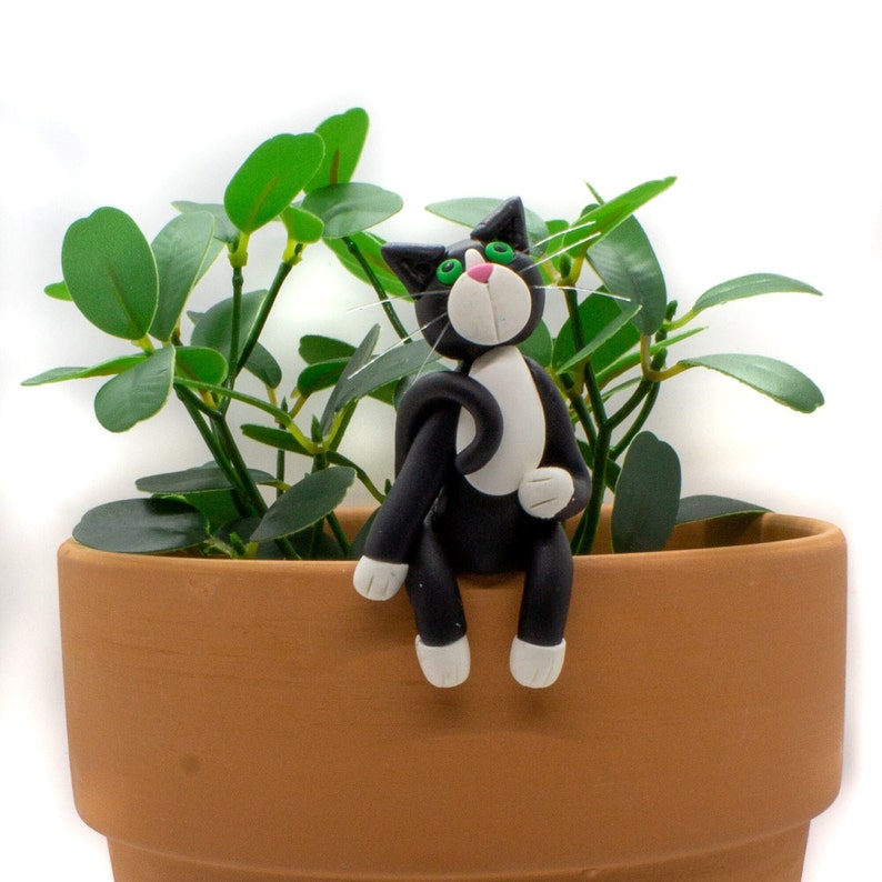 Funny Cat Pot Sitter