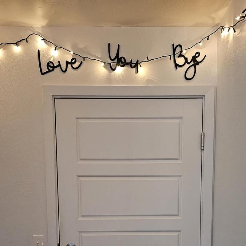Love You Bye Sign Above Door