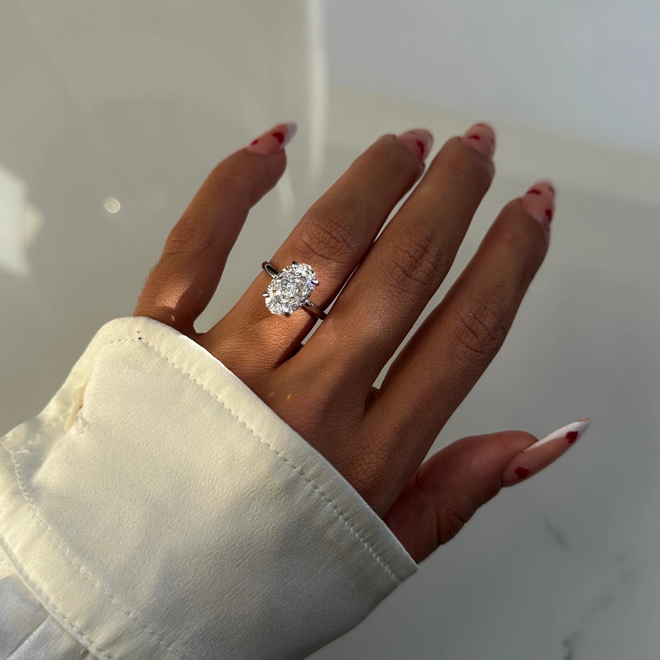 CRUSHED ICE OVAL CUT RING
