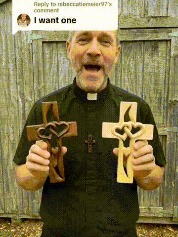 Handmade Wooden Double-Heart Cross Wall Decor in use