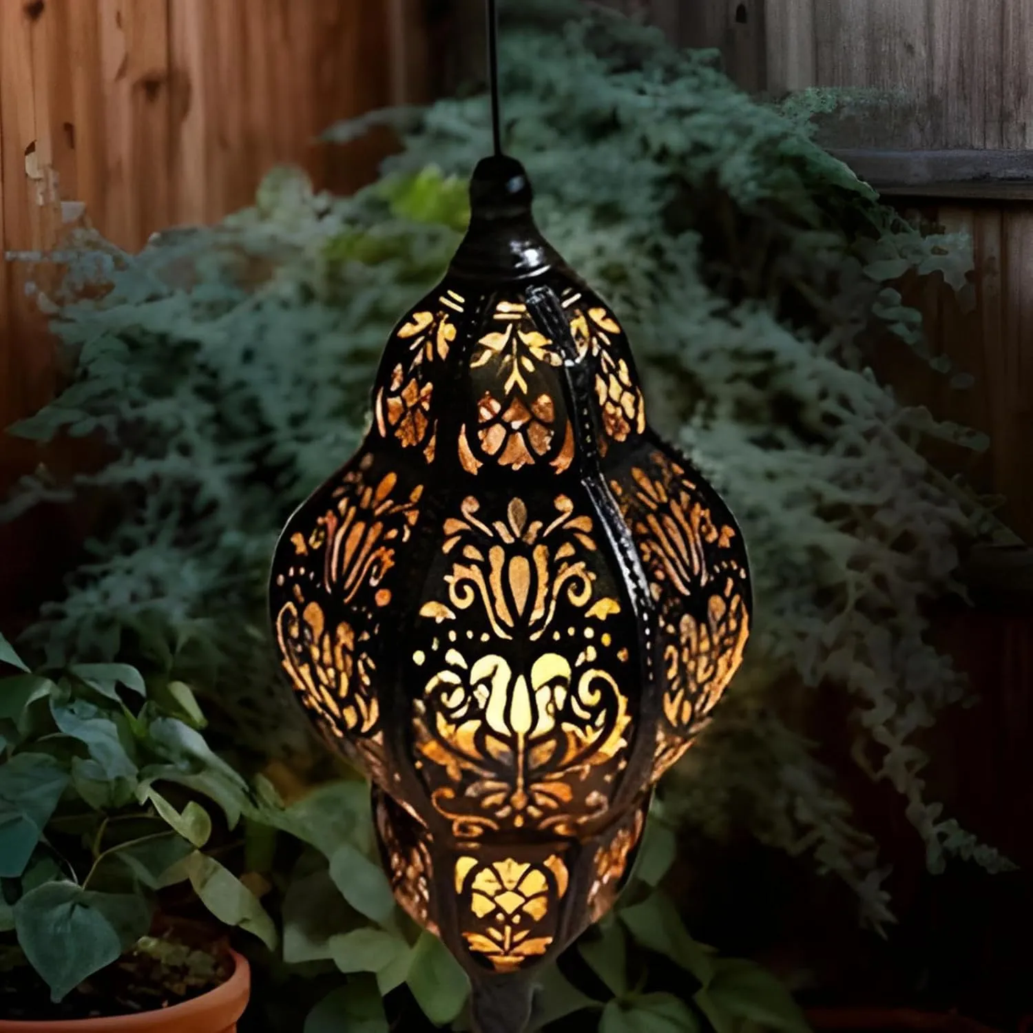 Baroque Solar Lantern: Enhance your garden’s nighttime elegance with vintage patterns that require zero wiring or maintenance. 🏺