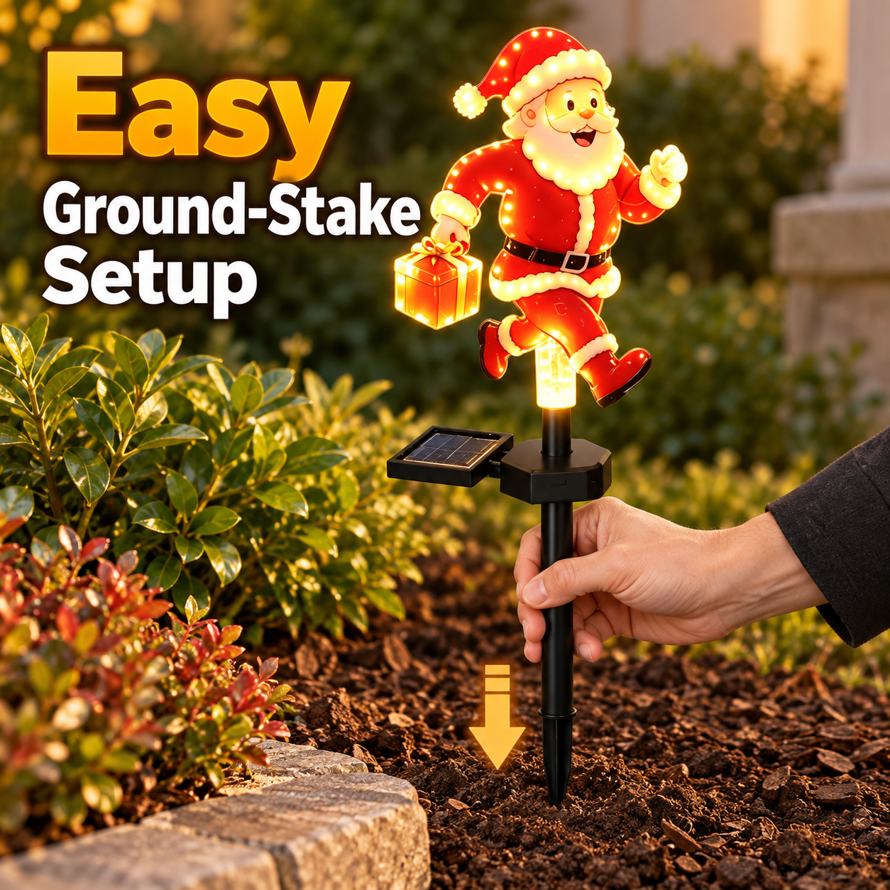 Hand pressing the pointed ground stake into garden soil