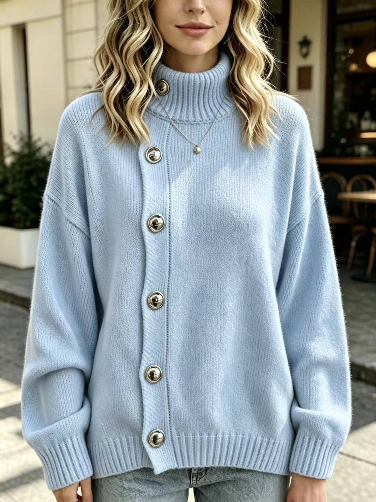 Solid high-neck sweater with metal buttons, loose fit
