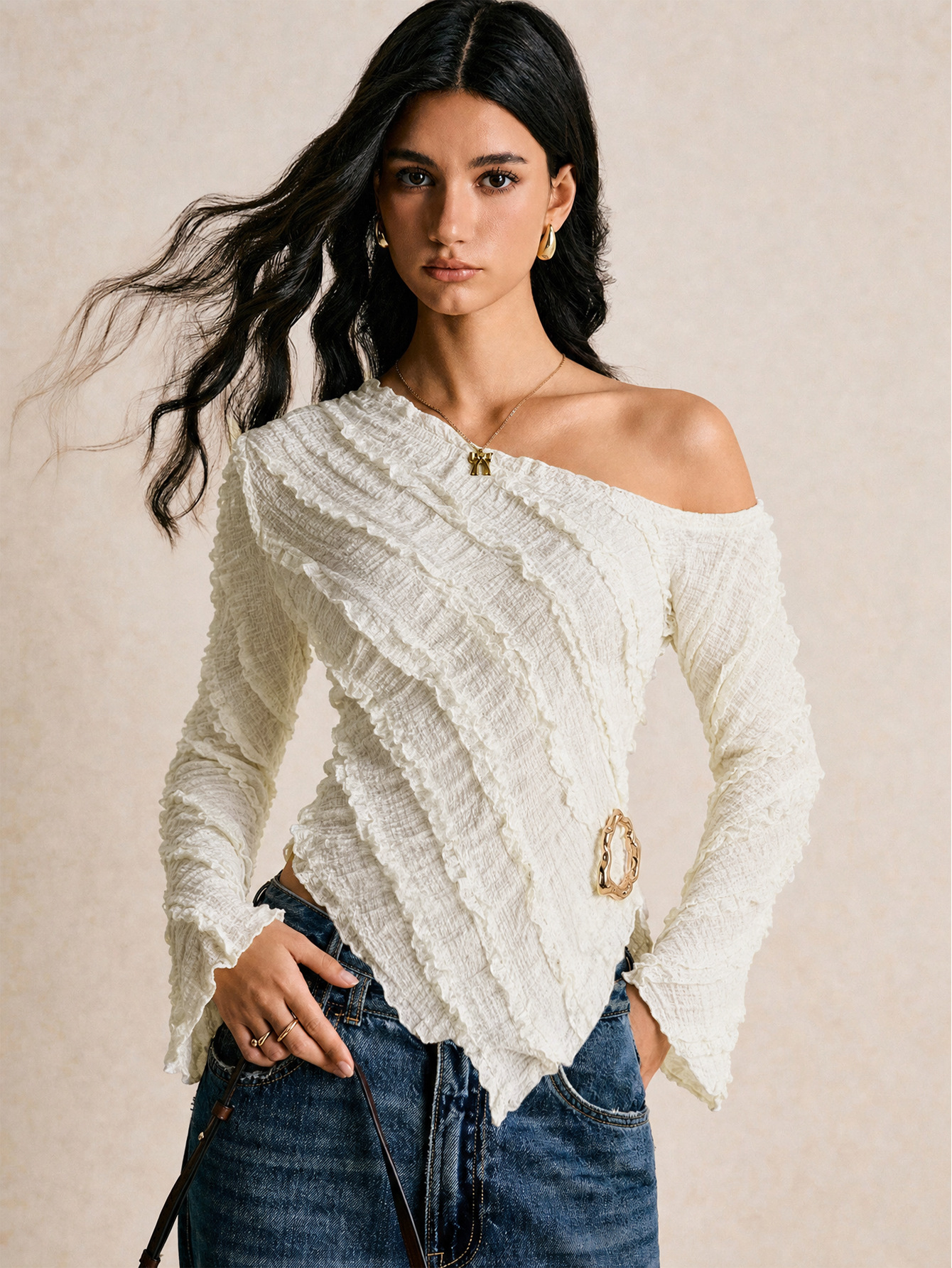 French textured one-shoulder long-sleeve top with asymmetrical hem